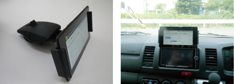 タブレットは車載ホルダーで固定して充電しながら使用可能の画像